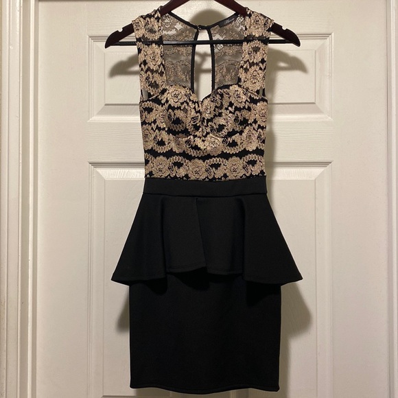 Dresses & Skirts - Cute black & gold dress